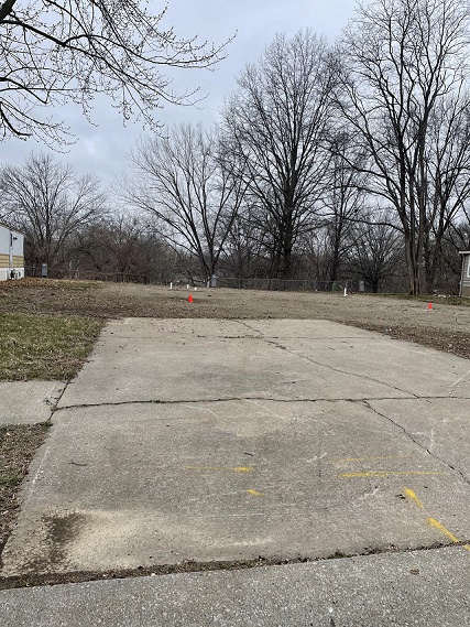 Narrow View of Vacant Lot